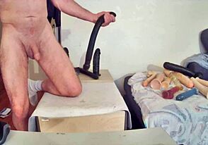 Solo gay twink enjoying his toys