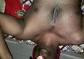 Deepthroat blowjob with a gay dildo in an Indian setting