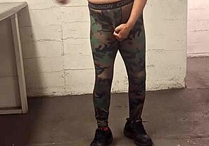 Gay camouflaged hunk in spandex
