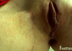 Red clothing with a pixie look, fetish content