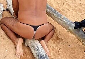 Single African American gay twink shows off his ass in panties at the beach