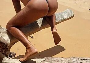 Ladysilva shows off his gay ass in a solo beach scene