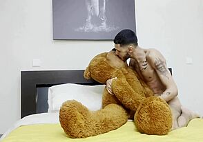 A femboy and a bear have fun with a gay blowjob and anal sex