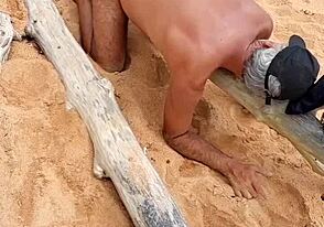 Single African American gay twink shows off his ass in panties at the beach
