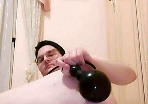 Gay fetish porn with extreme inflatable butt plug and fist play