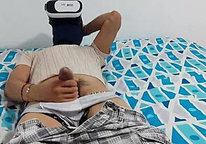 Gay man enjoys VR porn and masturbates with his big dick