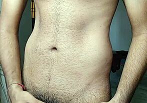 Hairy Indian guy in hotel room, pleasuring himself with a finger