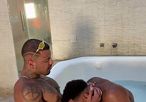 Two big black cocks in a motel bathroom scene