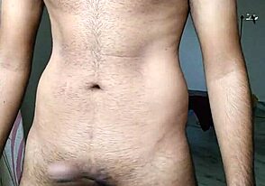 Hairy Indian guy in hotel room, pleasuring himself with a finger