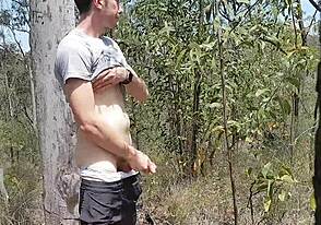 Gay jerk off with bush in public
