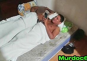 Young gay guy’s friend rests while getting a blowjob from his partner in crime