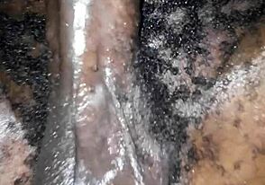 skinny african twink teases with oiled hairy black cock in solo play.
