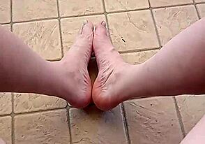 Young gay guy shows off his feet and bareback skills