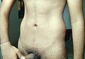 Hairy Indian guy in hotel room, pleasuring himself with a finger