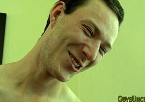 Two young gay men having raw anal sex in a porn movie