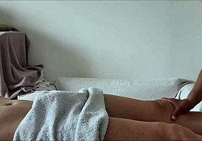 Young gay gets a full body massage with oil and a handjob in a cumplay room