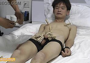 Playful skinny Asian twink bound with sex toys