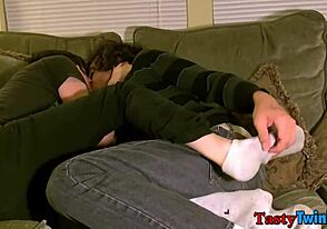 Two hot twinks make out while feet are being ticked, great stuff!
