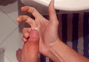 so, this twink’s just stroking his monster cock in front of the mirror. damn, that cumshot’s explosive!